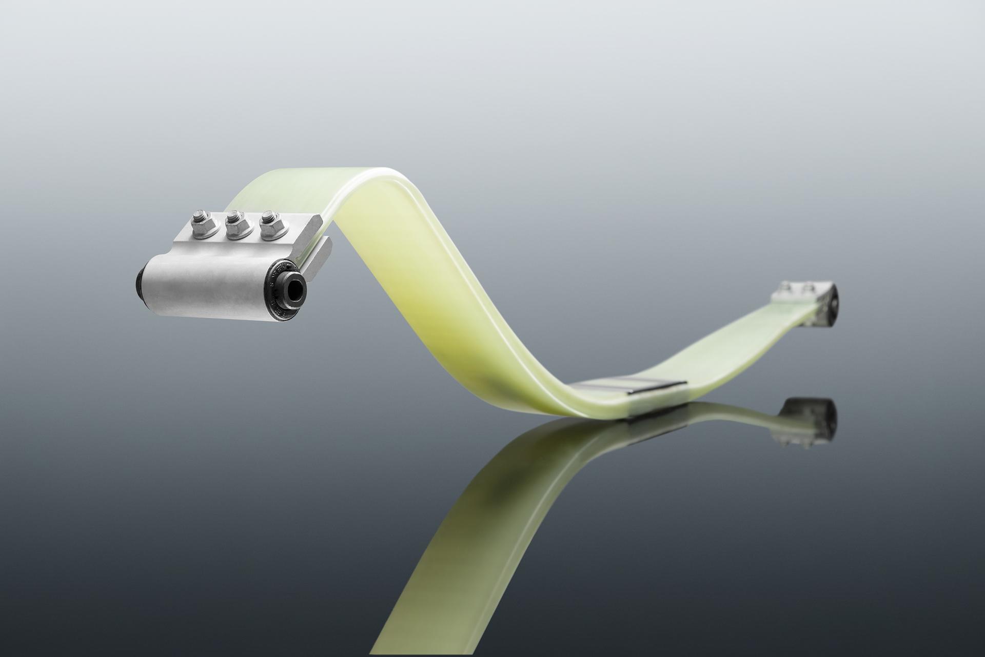 Innovative material, new design the GFRP tension leaf spring Mubea